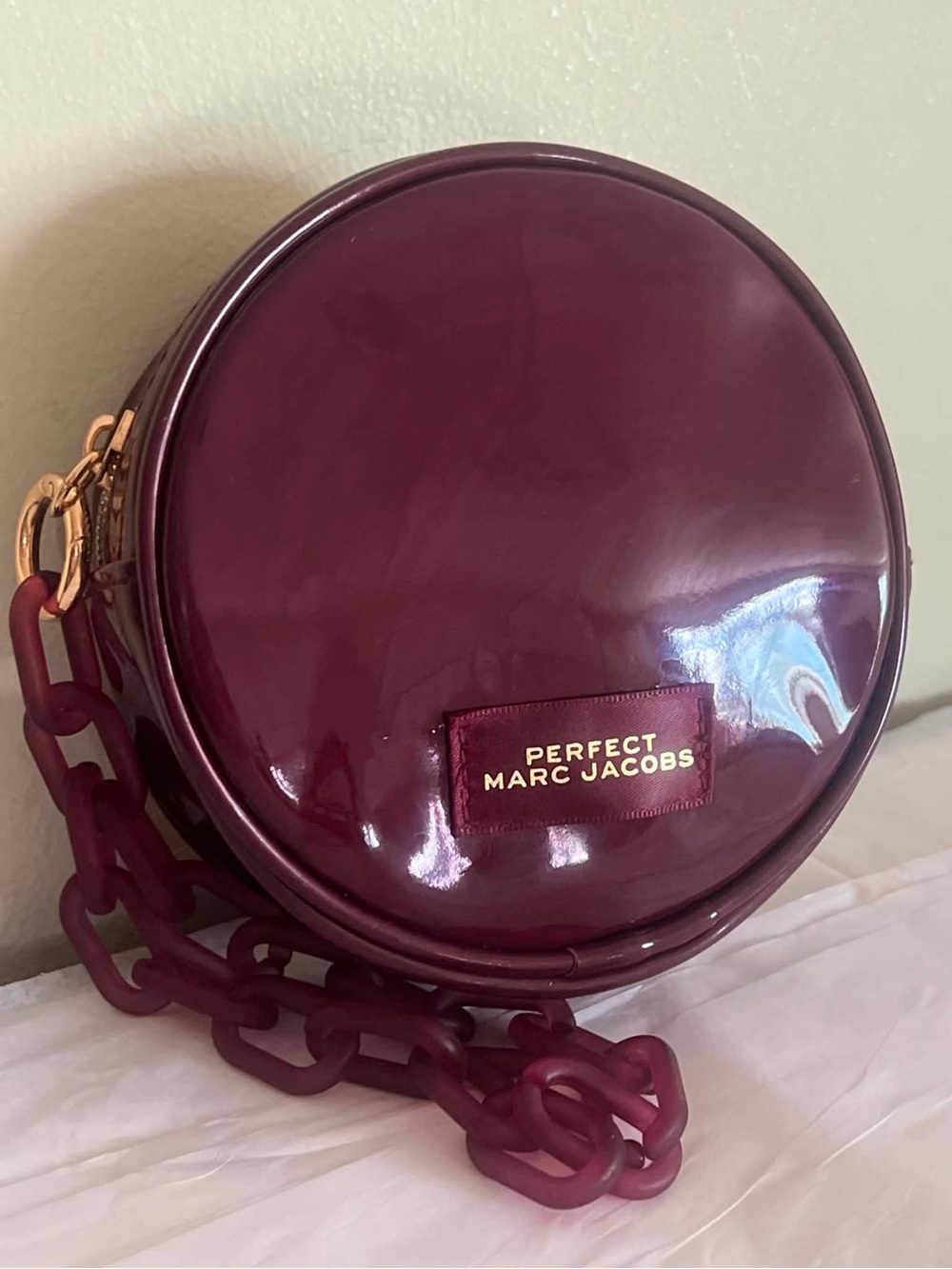 Marc Jacobs Round Makeup Wristlet in Plum with Gold Hardware